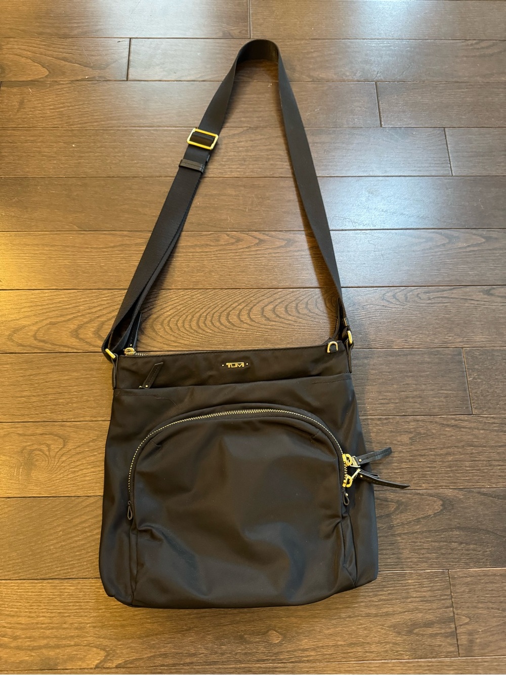 Tumi Black Nylon Messenger Bag with Gold-Tone Accents